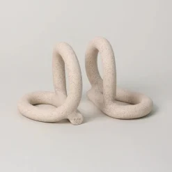 Bacchus Bookends, Sand